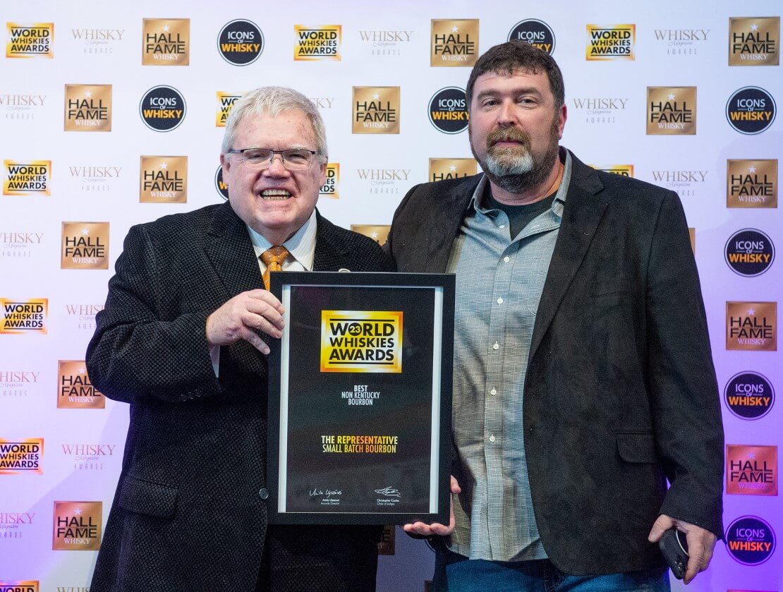 Dave Schmier, founder of Proof and Wood Ventures, accepting the Best Non-Kentucky Bourbon award in the World Whiskies Awards 2023 at the Whisky Magazine Awards America dinner in Louisville, Kentucky